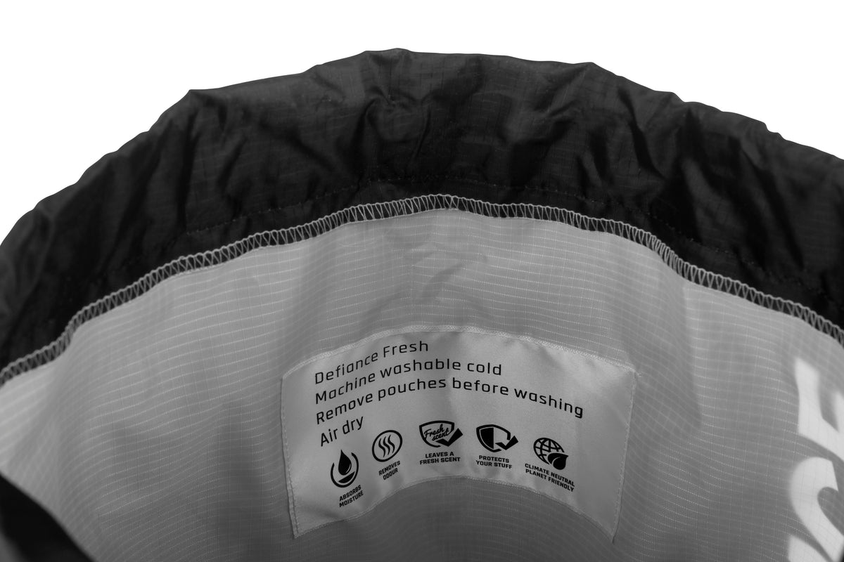 Gym and football kit bag with integrated odour absorbing pouch
