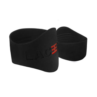 A pair of black Laceeze MAX Bands with red logo, designed to secure shoelaces on sports footwear.
